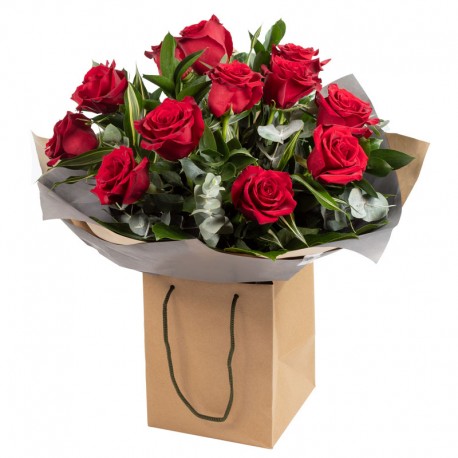 Dozen Red Roses Hand Tied Bouquet presented in Gift Bag